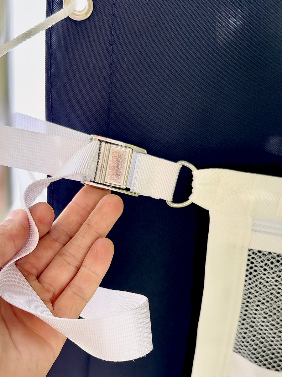 Close-up of the stainless steel cam buckle and white strap on the ZBAD1 marine grade cargo net